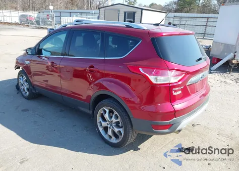2014 Ford Escape Titanium z USA, uszkodzony, nr VIN 1FMCU0J95EUA42920